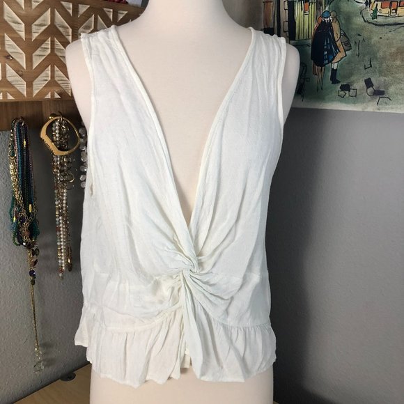 American Eagle Outfitters Tops - AE American Eagle ivory sleeveless Wrap Front high low hem Blouse  6362179640